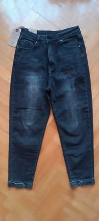 Nowe, wygodne, spodnie dżinsowe Water Jeans 42