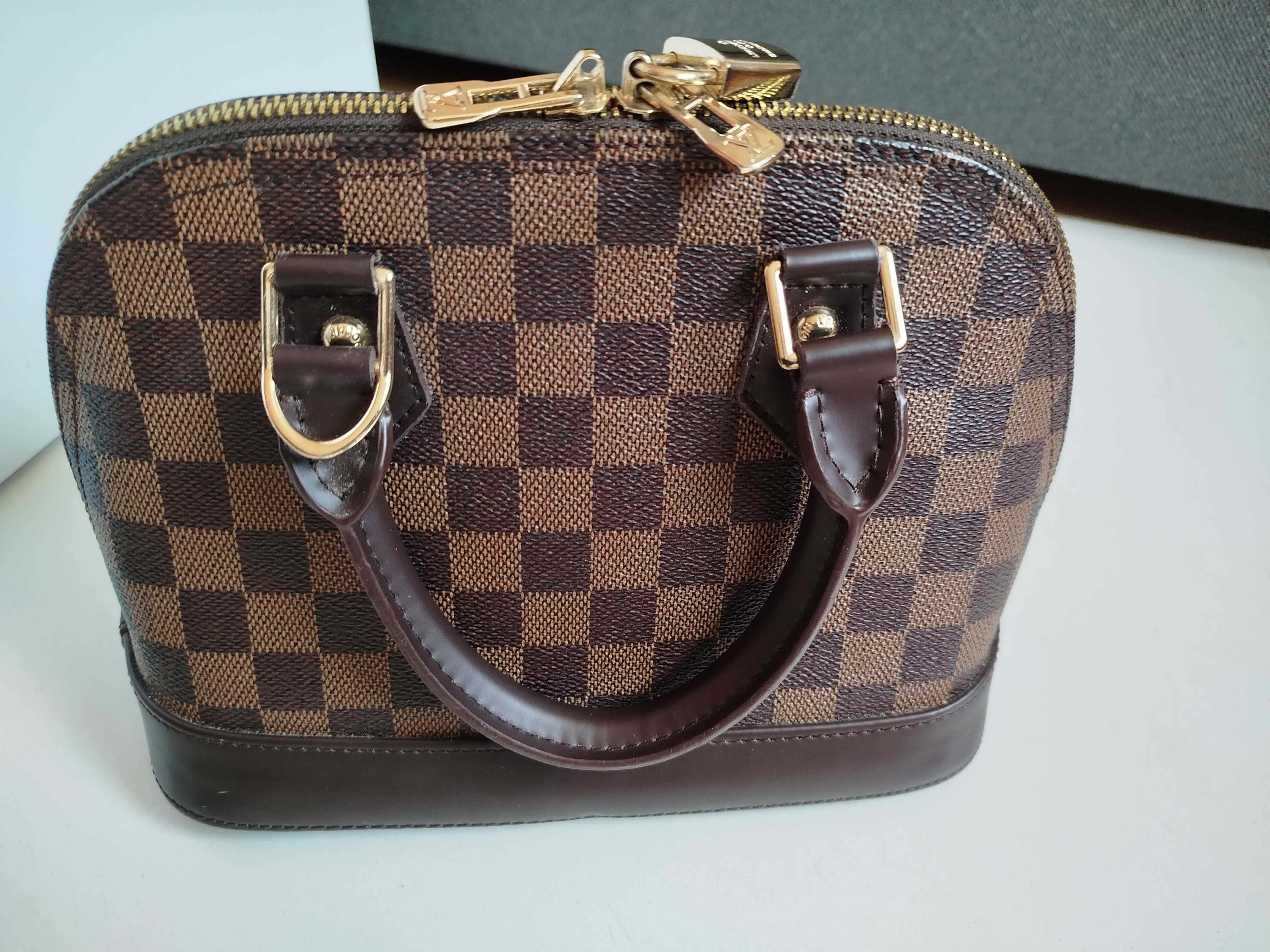 Luksusowa torebka do ręki Louis Vuitton