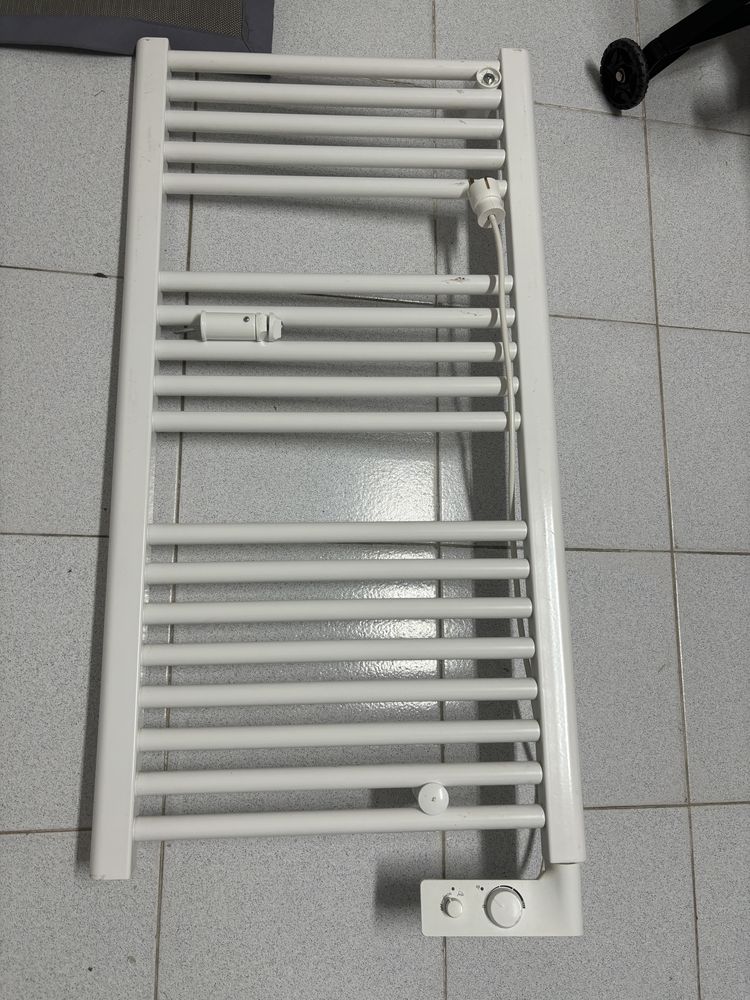 Seca toalhas electrico