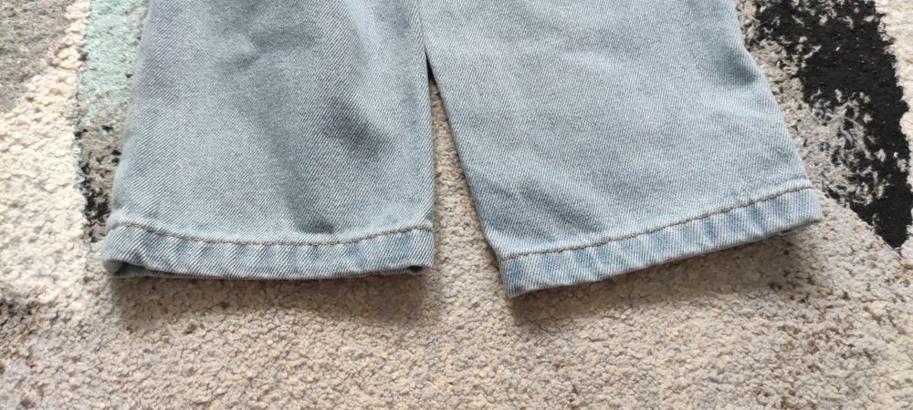 Jeansy niebieskie 134