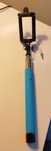 Selfie stick z przyciskiem