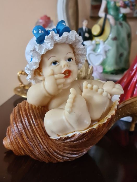 Skarbonka dziecko w muszli