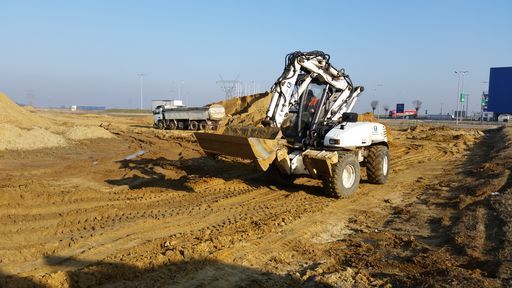 Koparko ładowarka mecalac 12 usługi wynajem koparki koparka