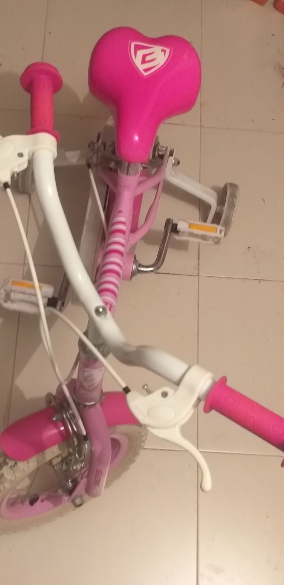 Bicicleta rosa menina