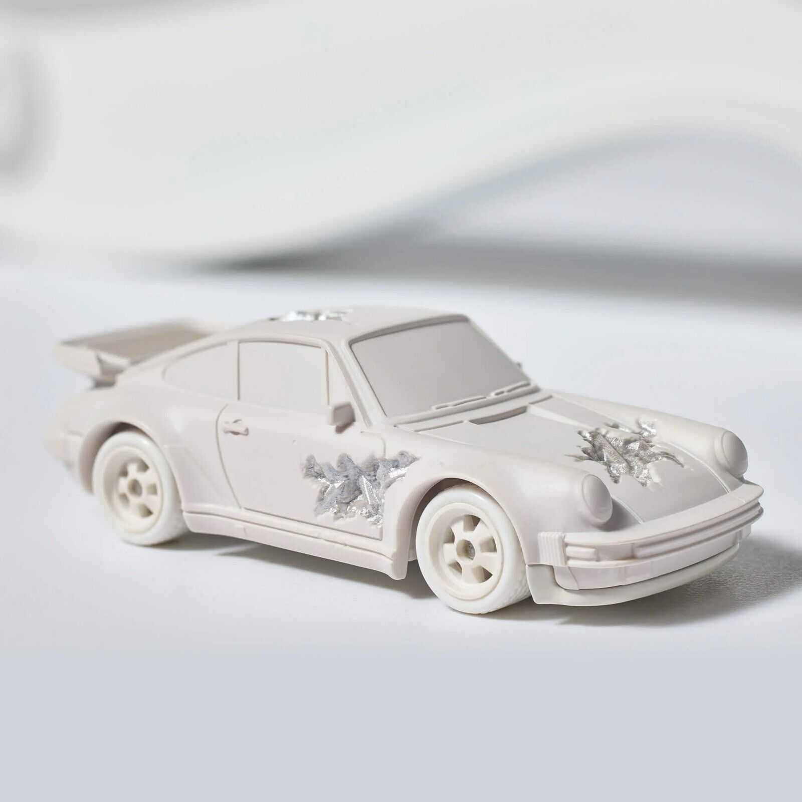 Hot Wheels x Daniel Arsham Eroded Porsche 930 and Rally Case
