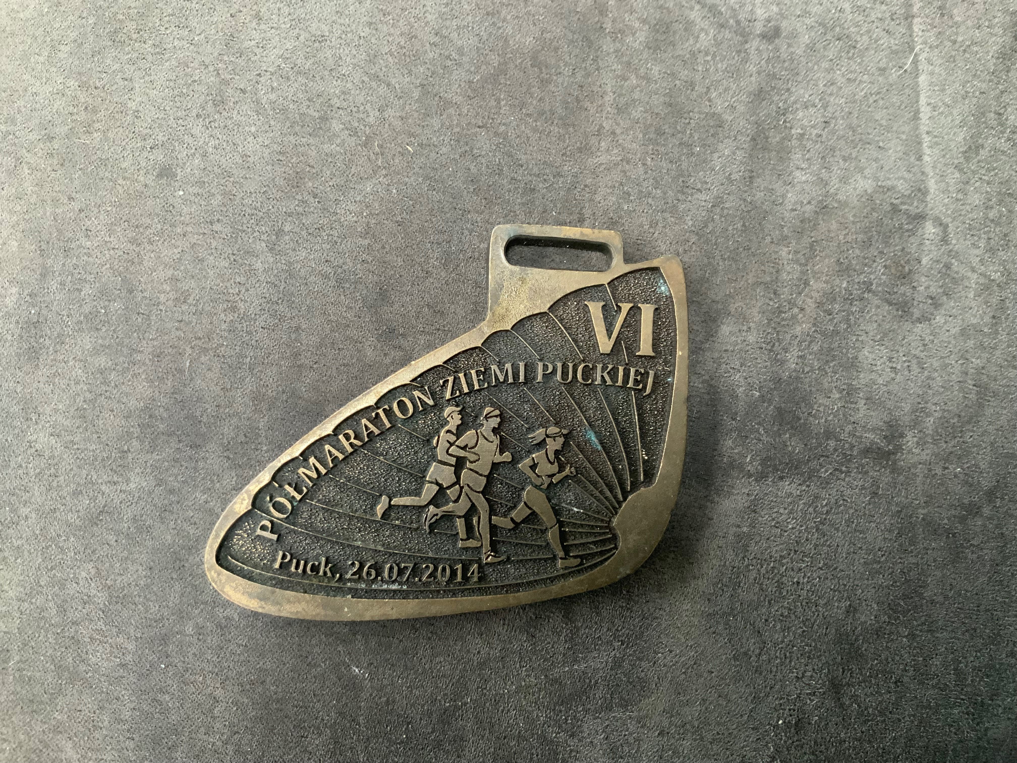 Medal pamiątkowy . Półmaraton ziemi puckiej 2014