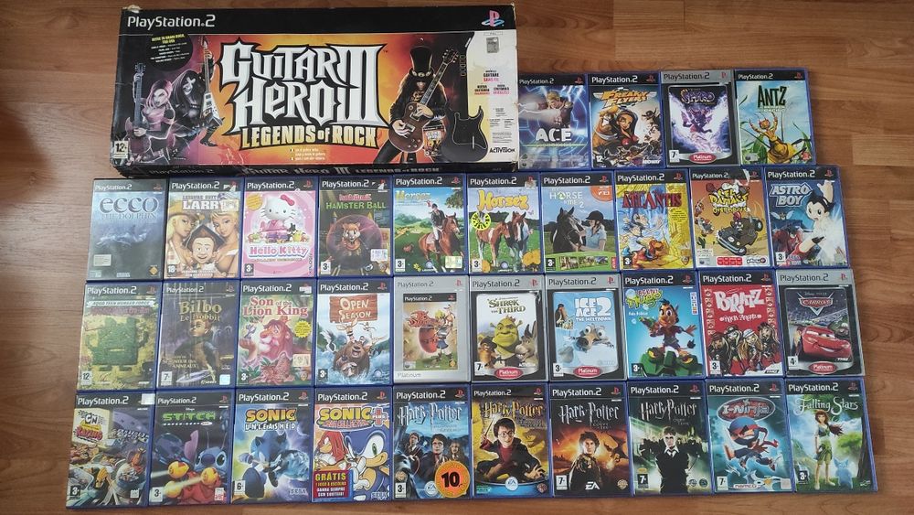 Jogos PlayStation 2, Xbox Og, GameCube e Guitar Hero