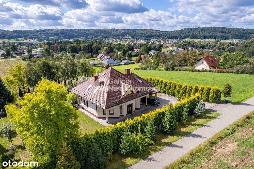 Komfortowy dom na widokowej działce, duży ogród