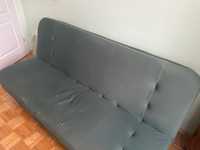 Rozkładana sofa w kolorze zielonym