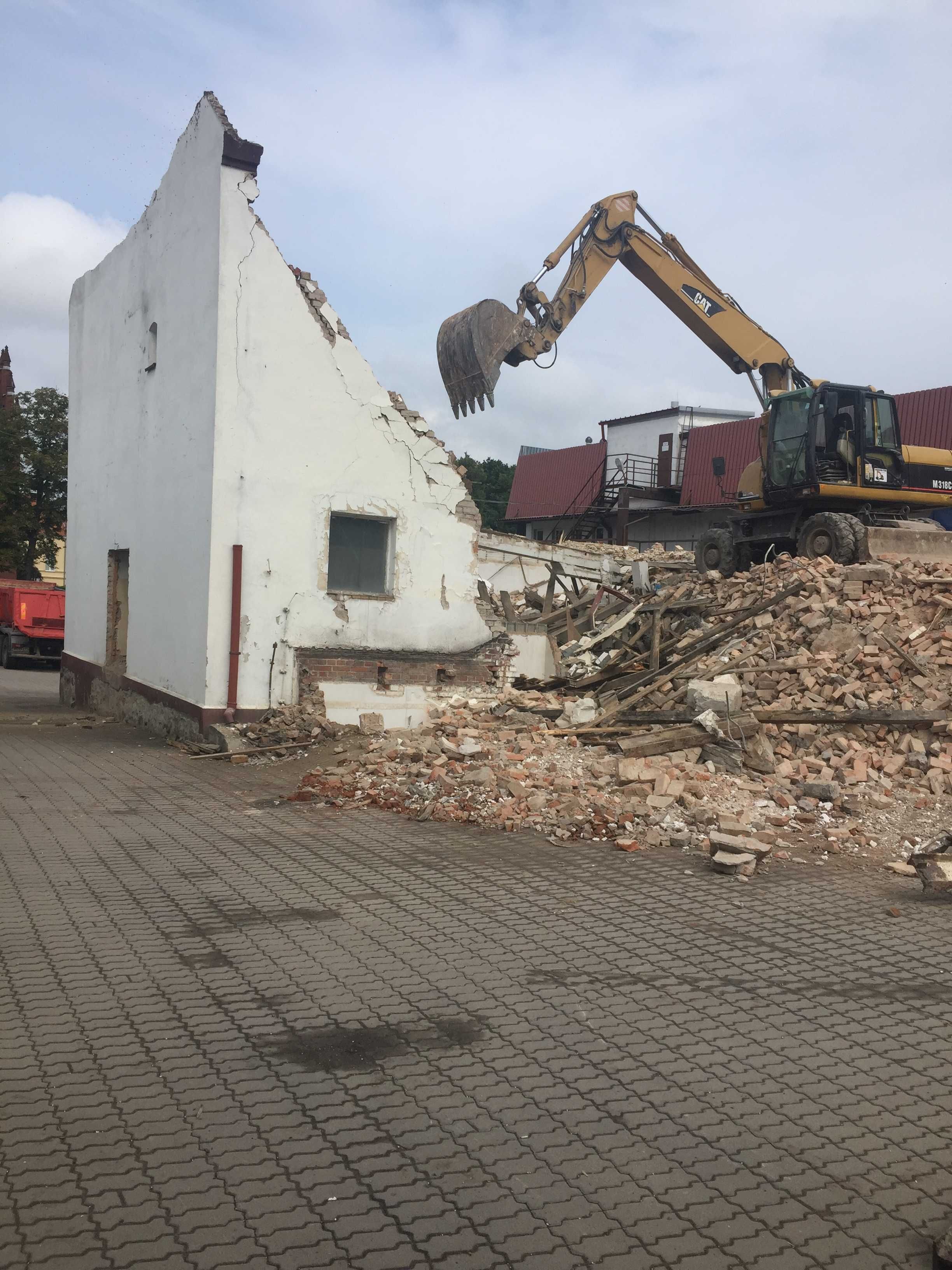 Rozbiórki wyburzenia kucie młotem prace ciężkim sprzętem