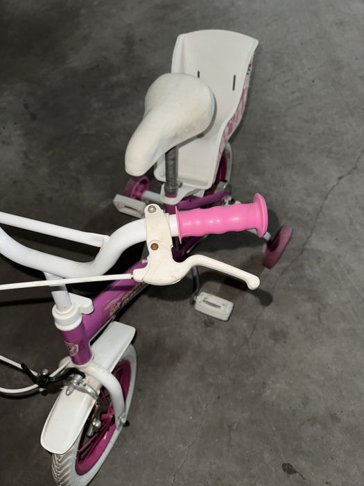 Bicicleta branca e rosa crianca