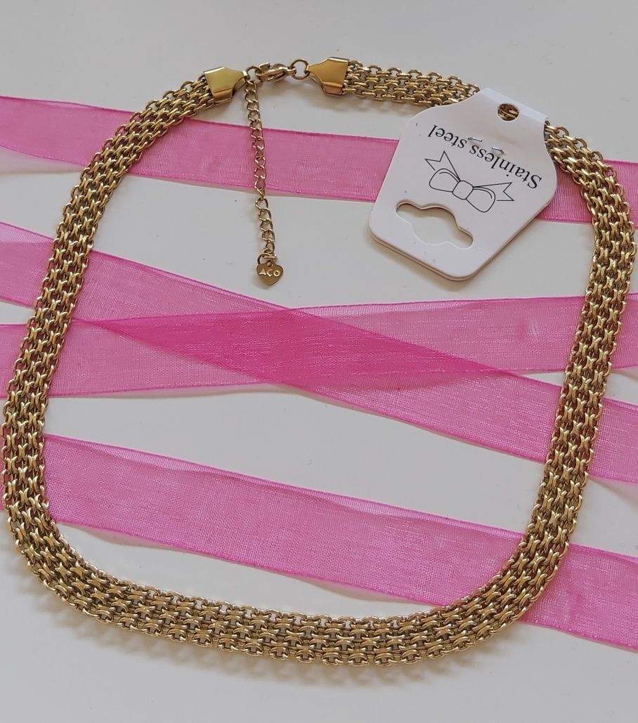 Colar/choker dourado, em aço, com extensor.