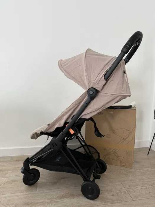Cybex Coya z pałąkiem Nowa Cozy Beige