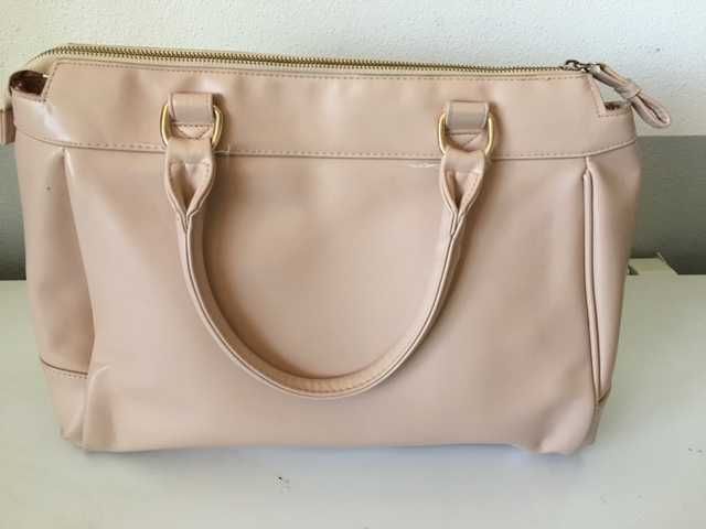 Mala Super gira rosa claro