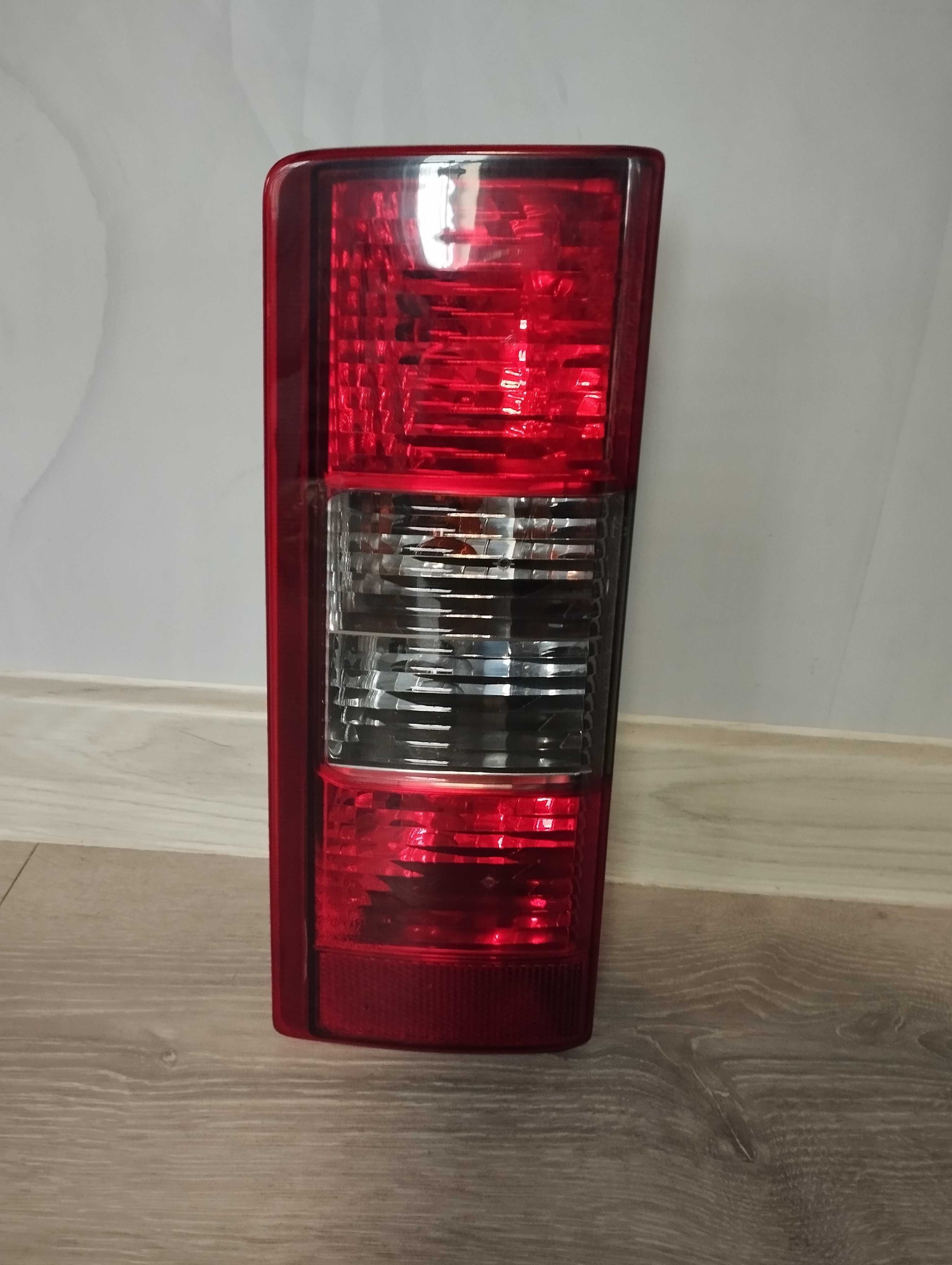 Lampa Opel combo C 2011 lewa tylna lewy tyl ]