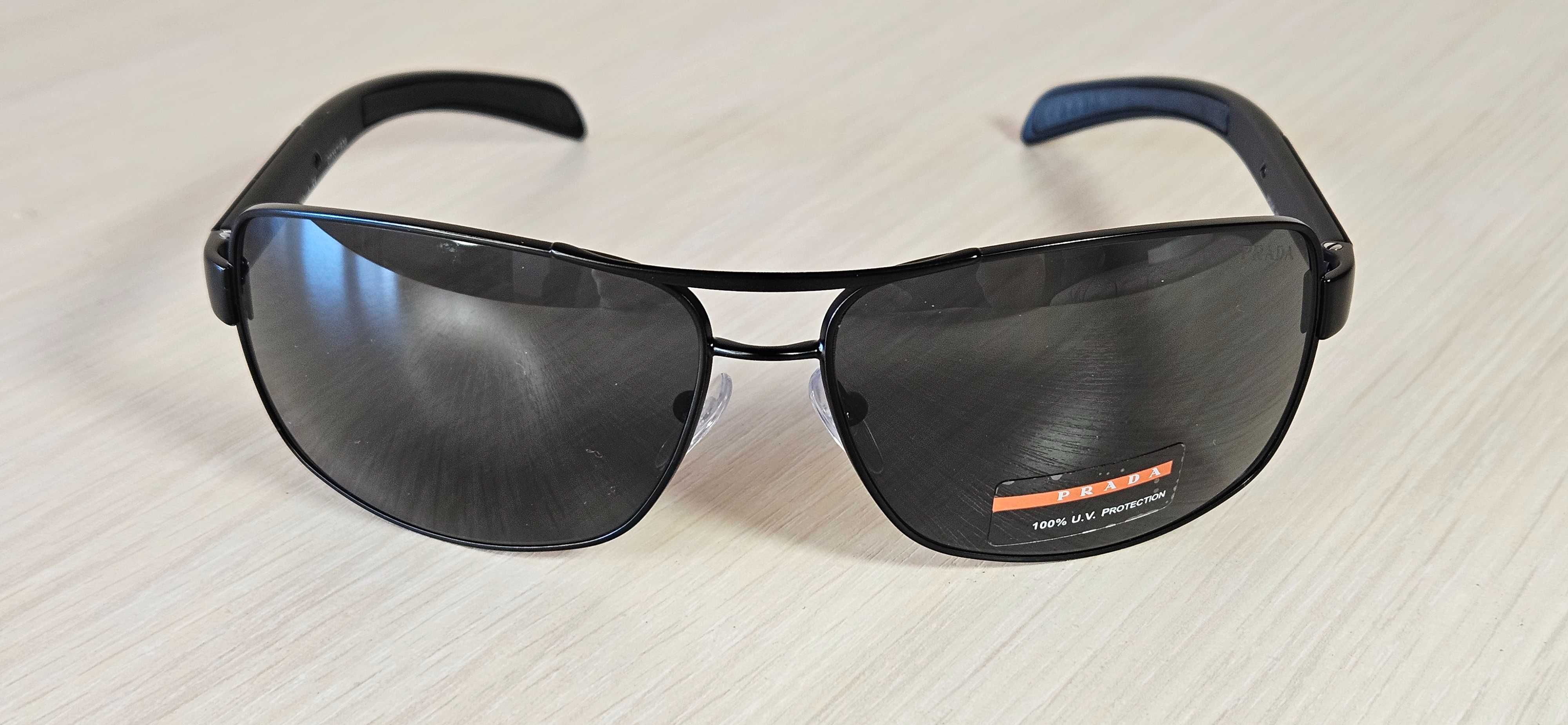 PRADA. Сонцезахисні окуляри PRADA SPS 54I 1BO-1A1 65 мм.