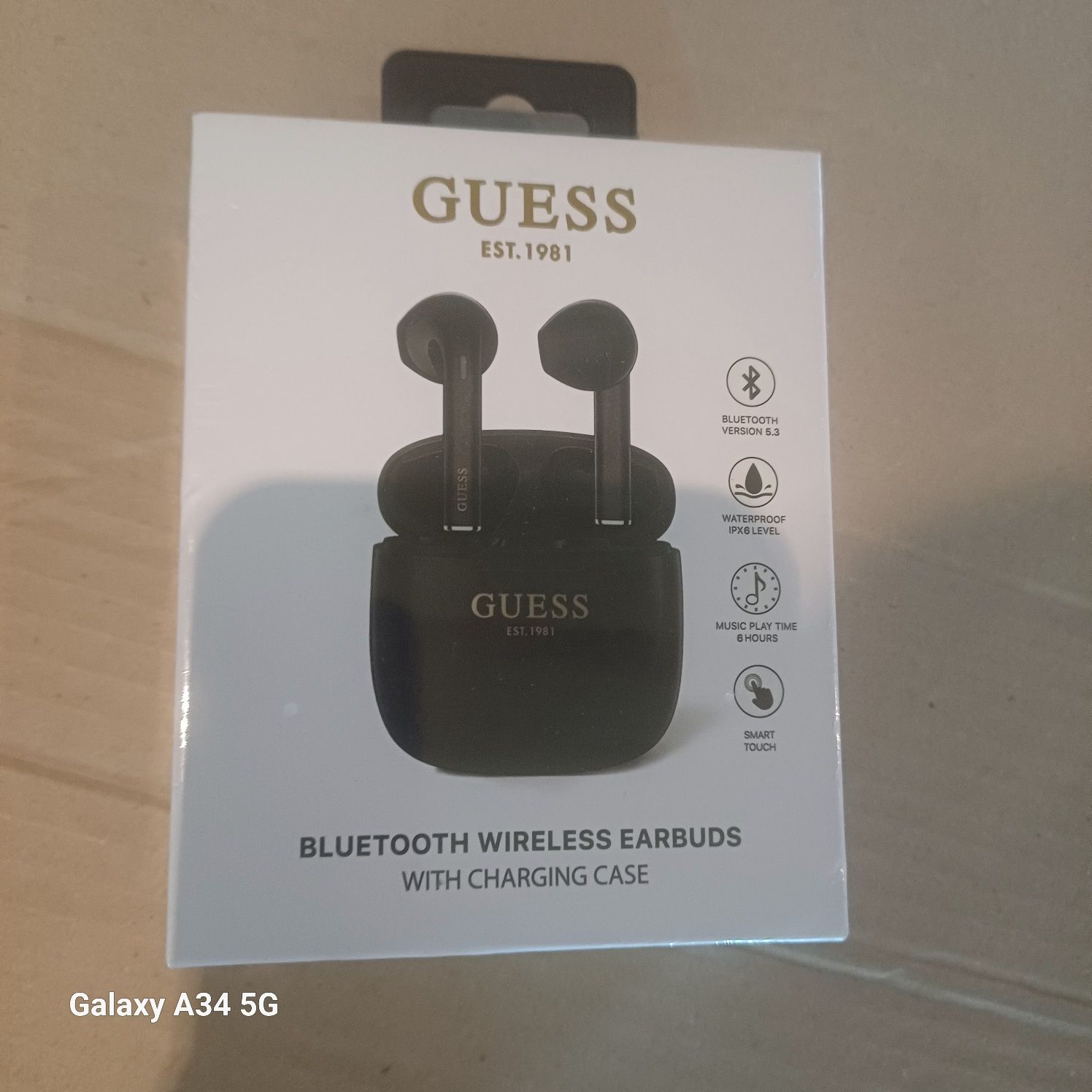Безпровідні навушники Guess