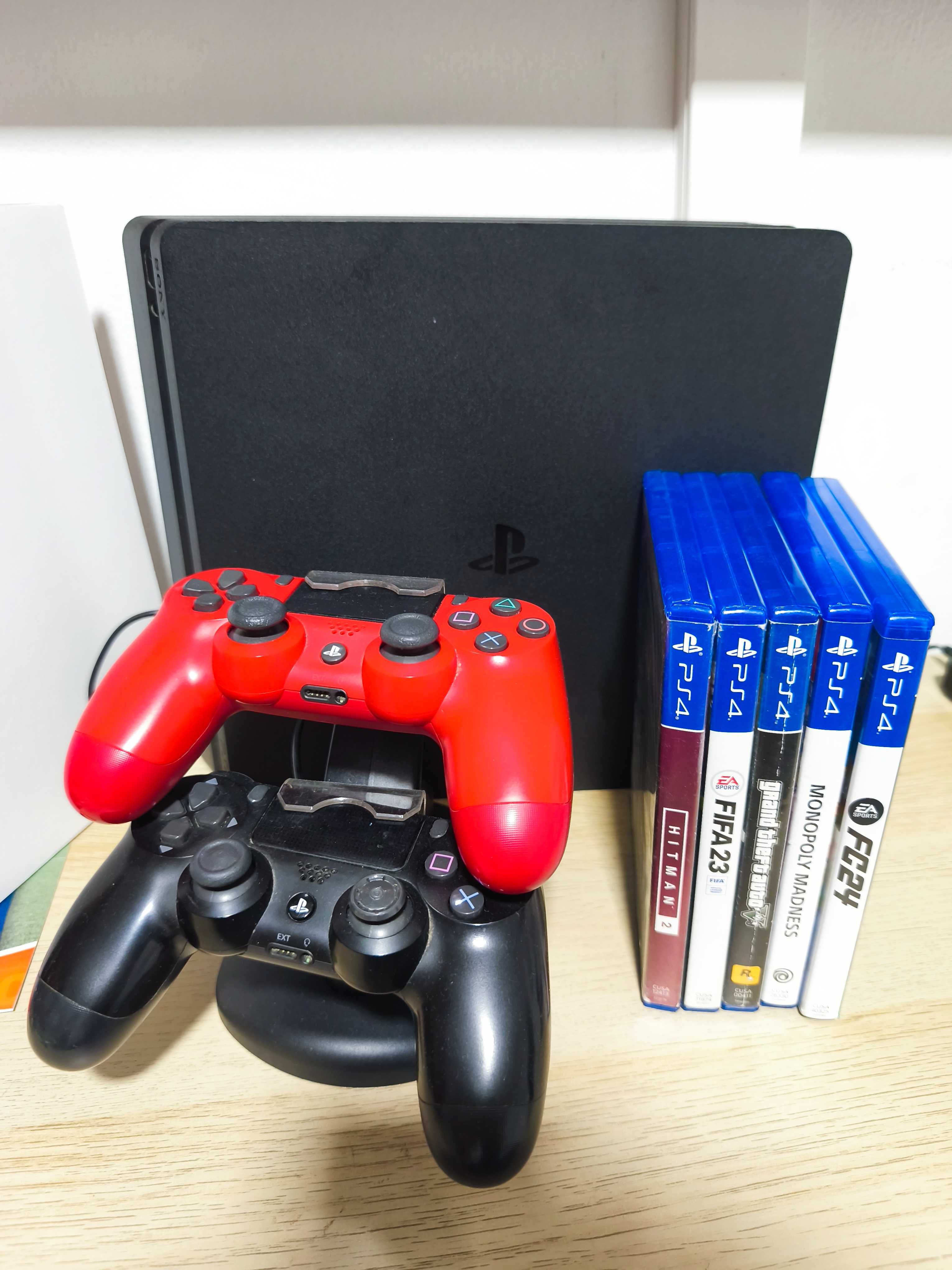 Ps4 slim + 2 comandos + 5 jogos
