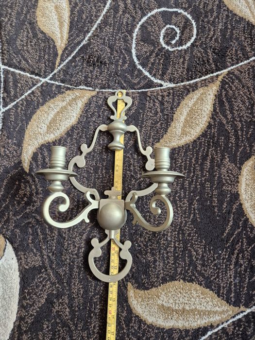 Mosiężny kinkiet świecznik