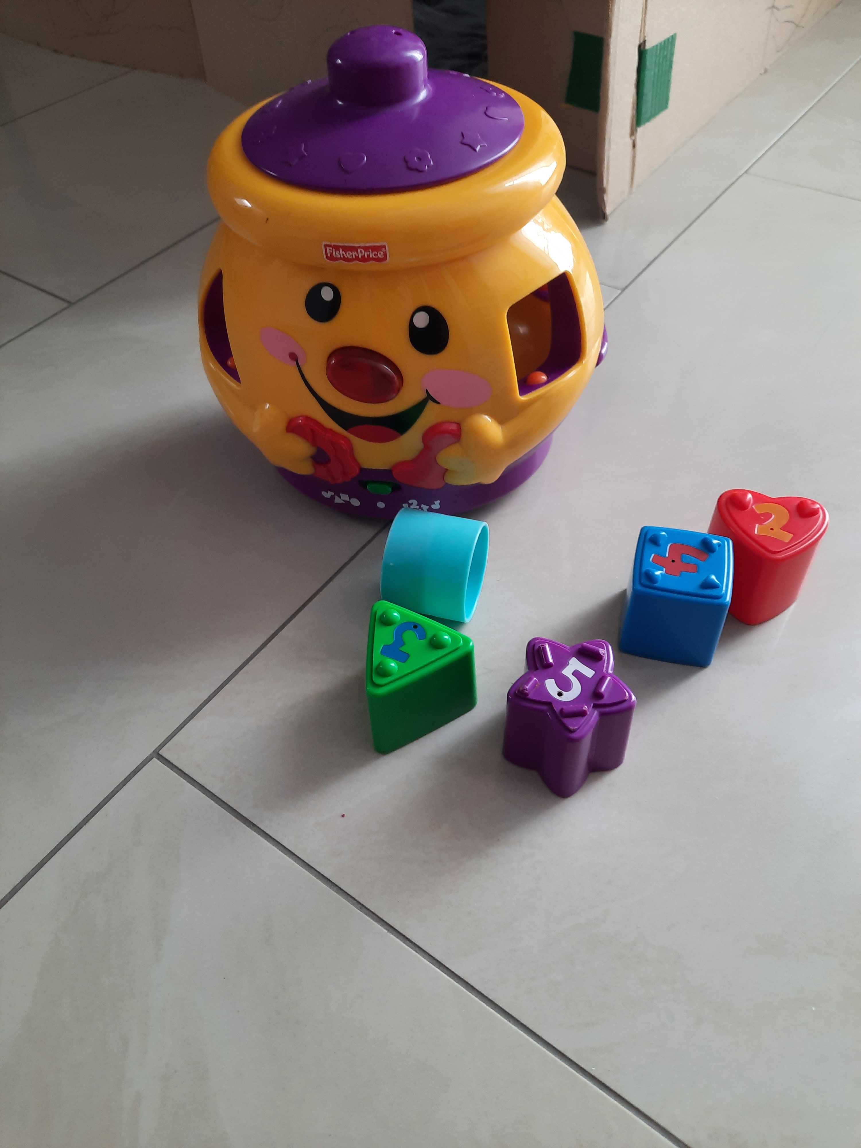 Garnuszek na klocuszek Fisher Price idealny