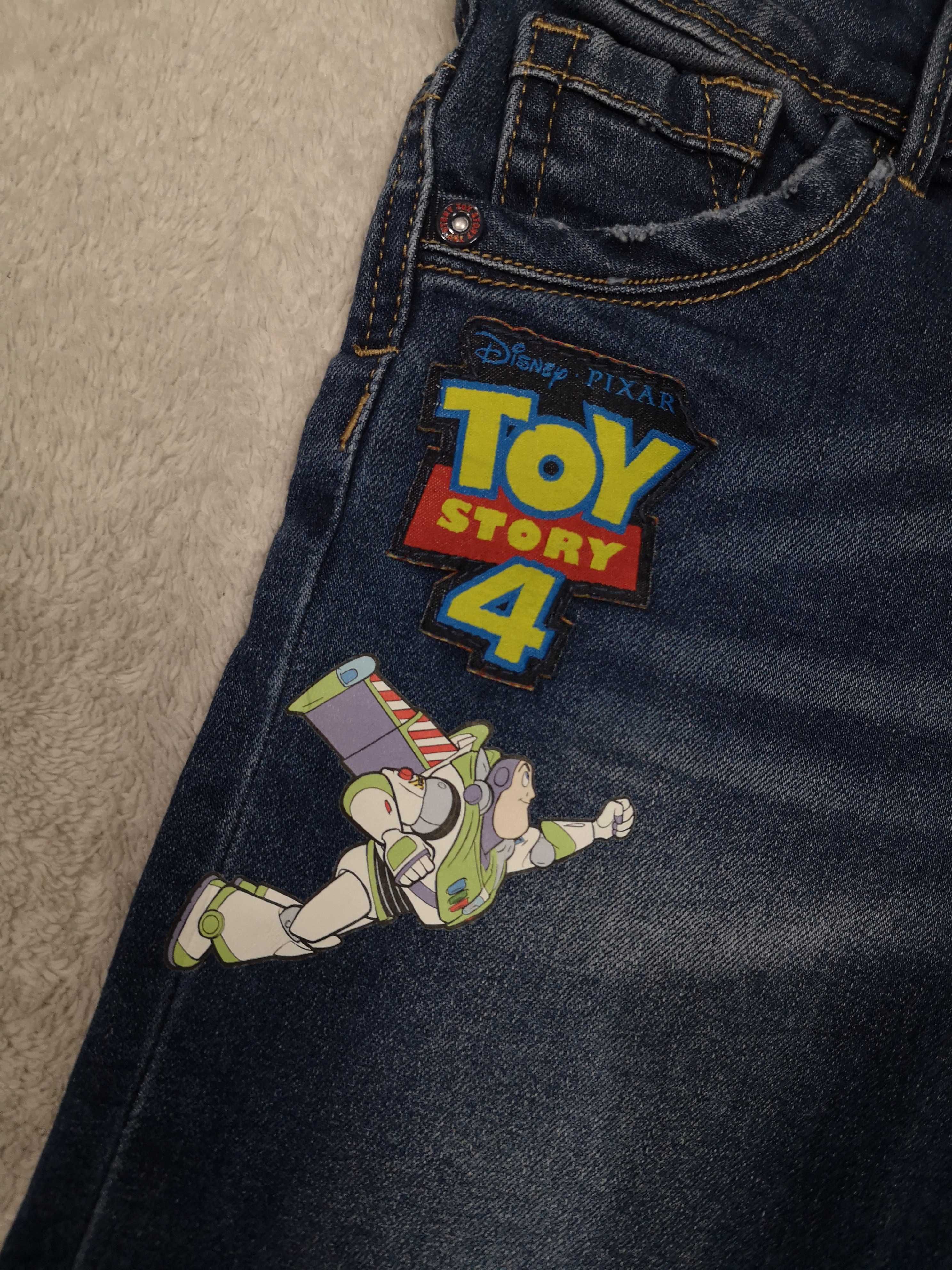 Granatowe krótkie spodenki szorty jeansowe Toy Story 122 jak nowe