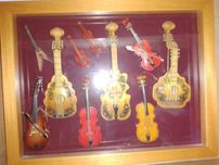 Miniaturas de instrumentos de corda