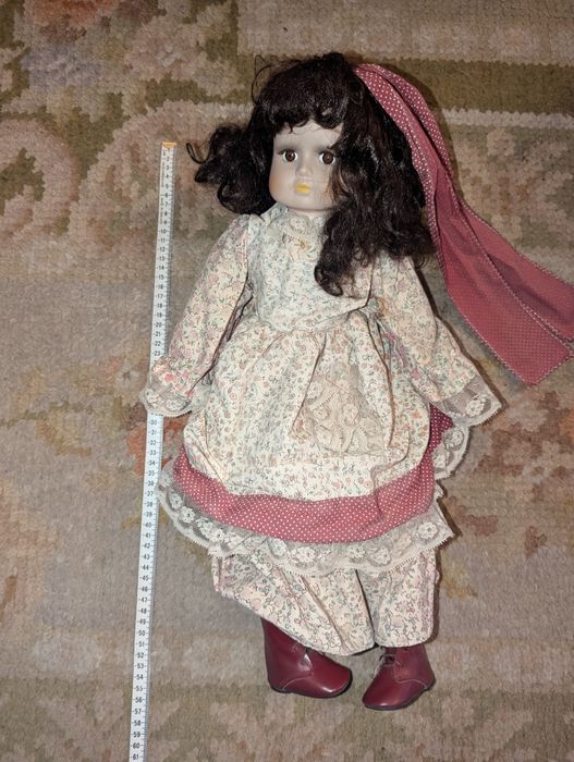 Bonecas antigas com cabeça em louça