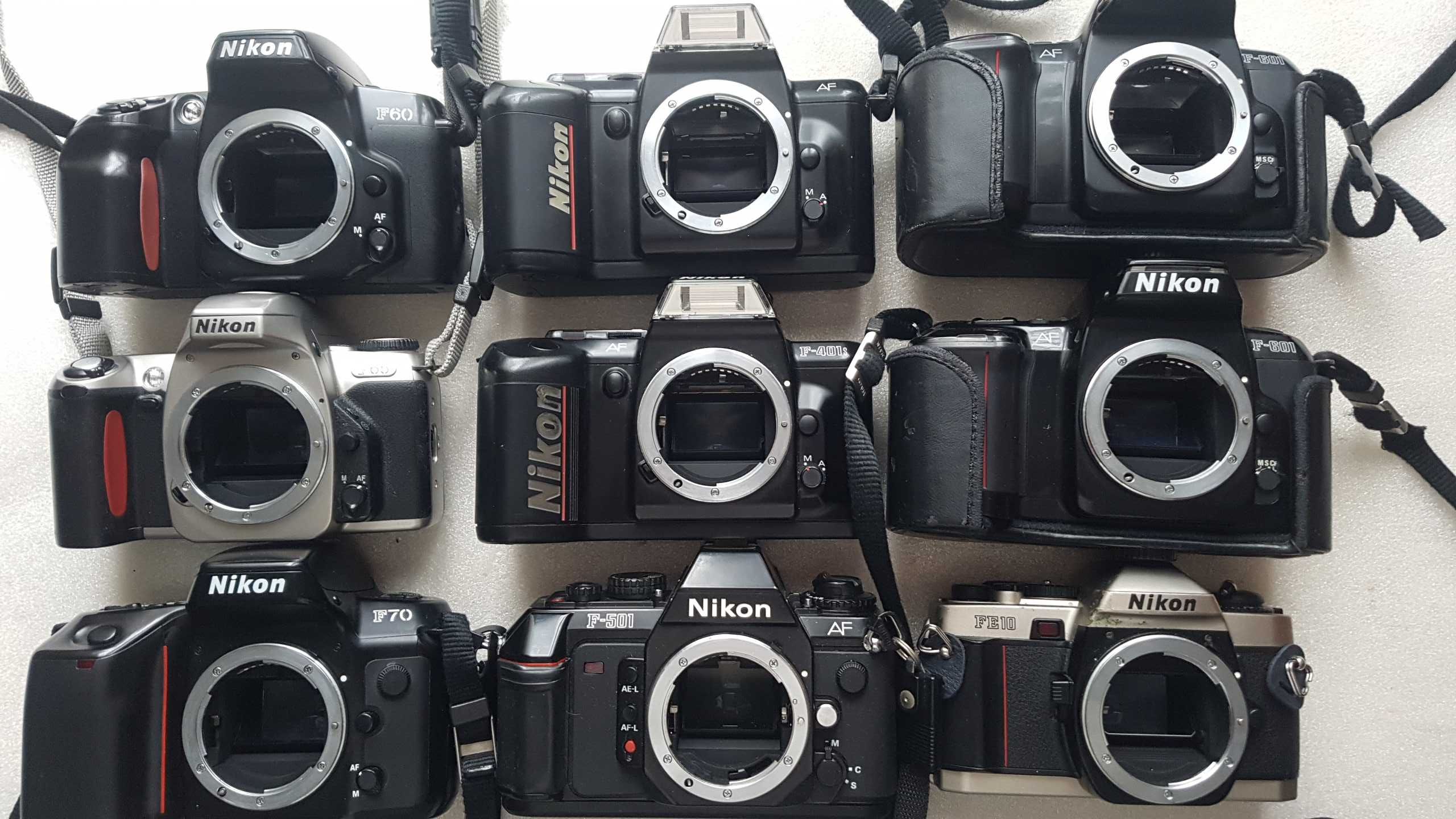 Плівкові фотоапарат Canon і Nikon