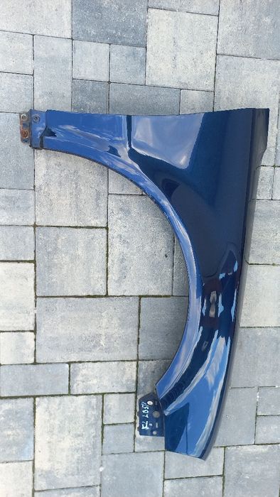 VW Passat b5 fl lift blotnik przedni prawy granatowy lb5n