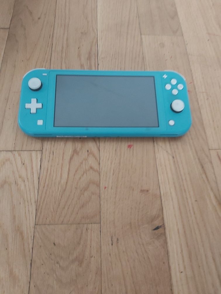 Nintendo switch lite niebieskie i oryginalna ładowarka