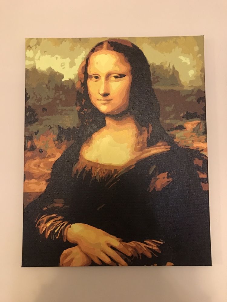 Obraz Mona Lisa nabity na drewniana rame