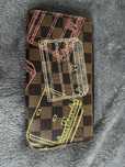 Limitowany portfel Louis Vuitton Zippy long damier trunks