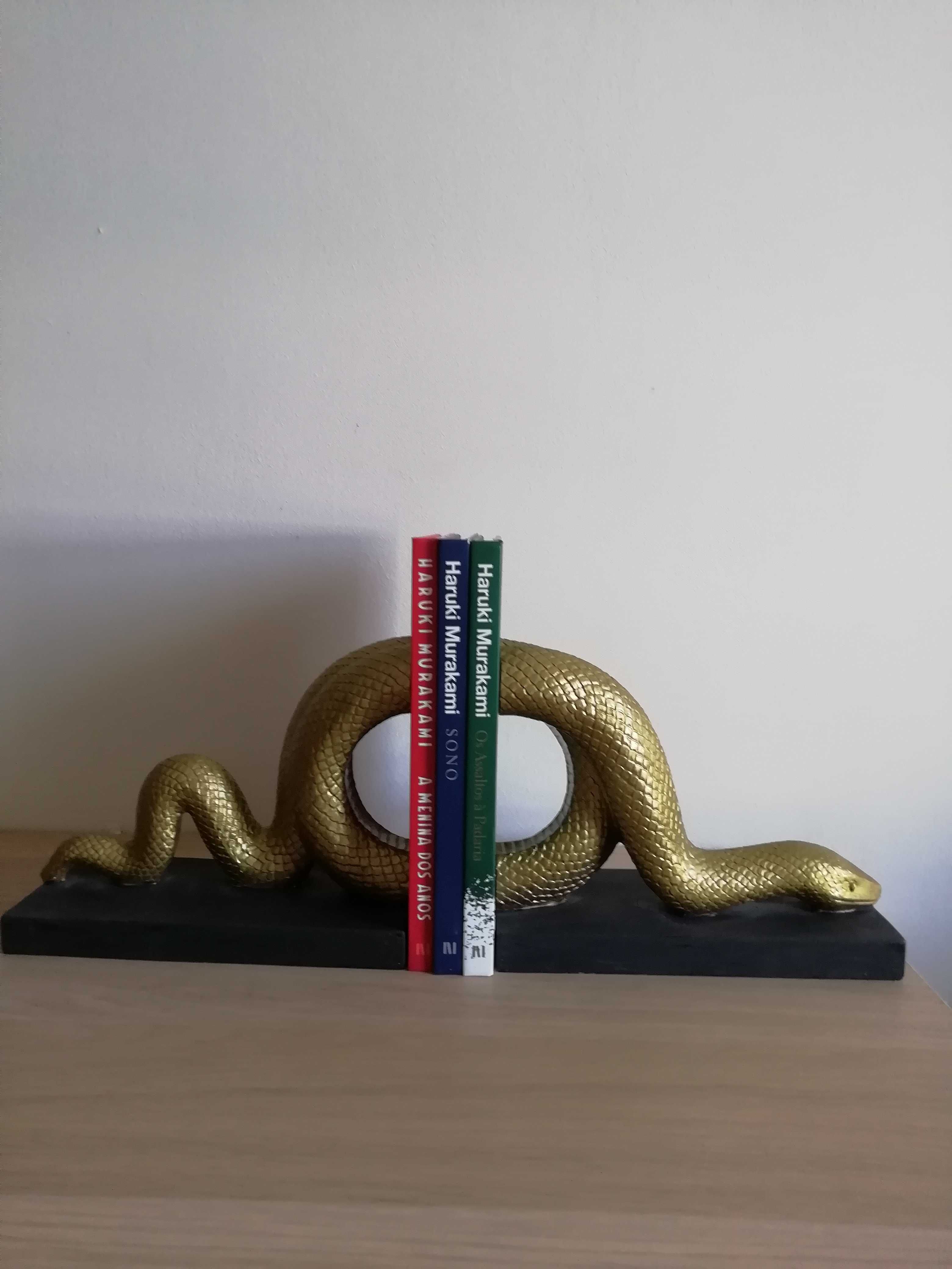 Vendo suporte para livros em pedra preto e dourado, práticamente novo.