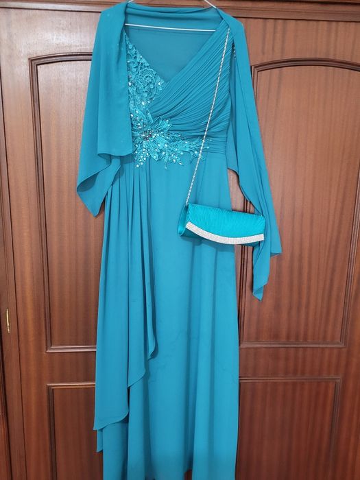 Vestido veste desde S ao M atras é elástico