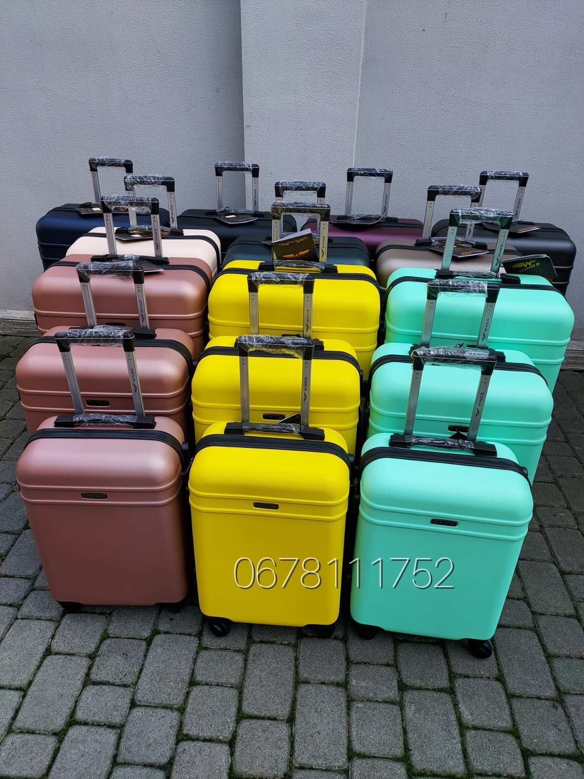 Розмір М 1500 грн. WINGS 219 Польща валізи чемоданы сумки на колесах