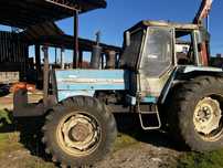 Landini 13000 com grua e reboque frorestal