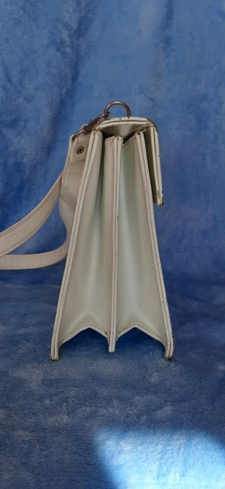 Вінтажний ,натуральна шкіра чемоданчик .