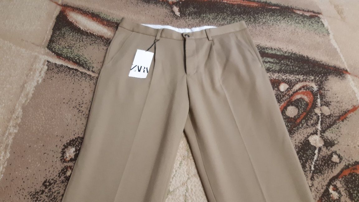 Spodnie Zara męskie.NOWE z metką za połowę ceny.Rozmiar 44.L-XL.