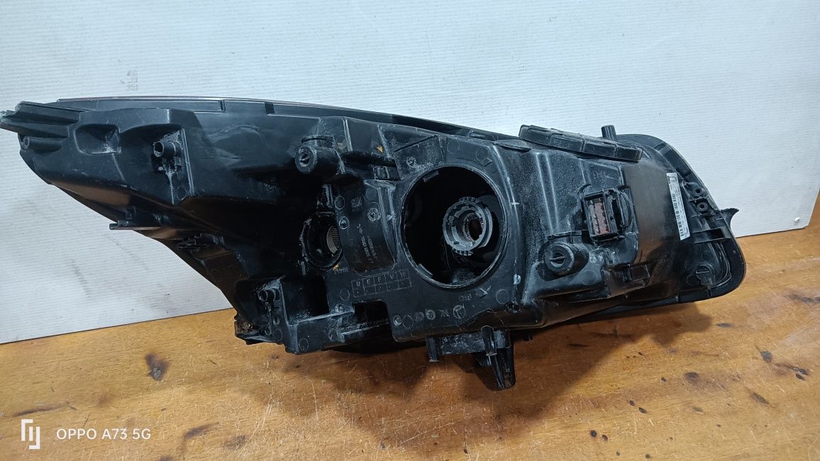Farol Opel Insignia ótica xenon 2009