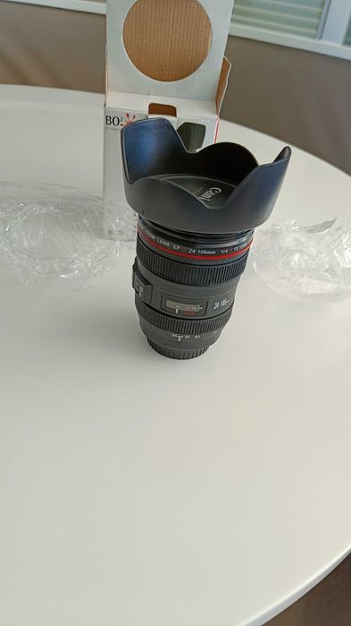 Copo novo com aspeto de lente fotográfica