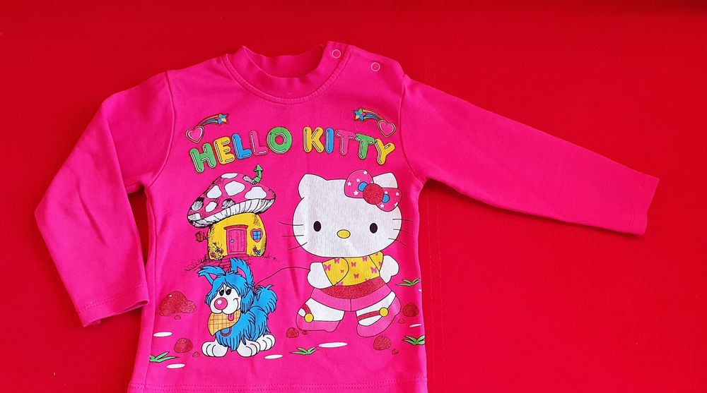Różowa bluzka Hello Kitty.74- 80.
