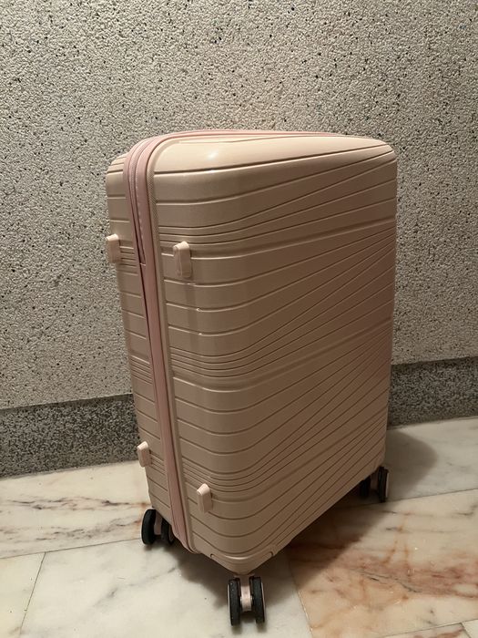 Mala de viagem rosa