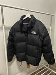 Puchowa kurtka The North Face z wypełnieniem 700 puchu gęsiego R-XL.