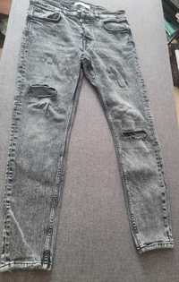 Spodnie jeans spodnie dżinsowe Zara 42 z rozdarciami