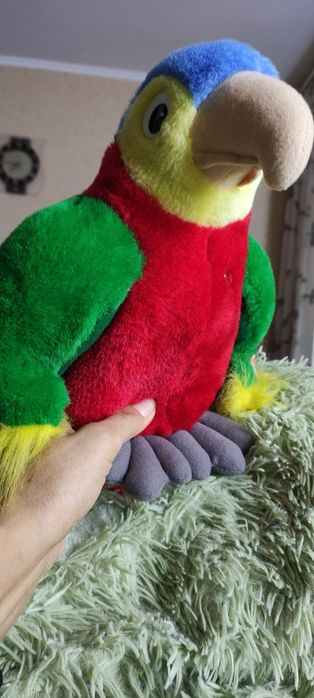 М'які іграшки ,,попугай має  електронний механізм