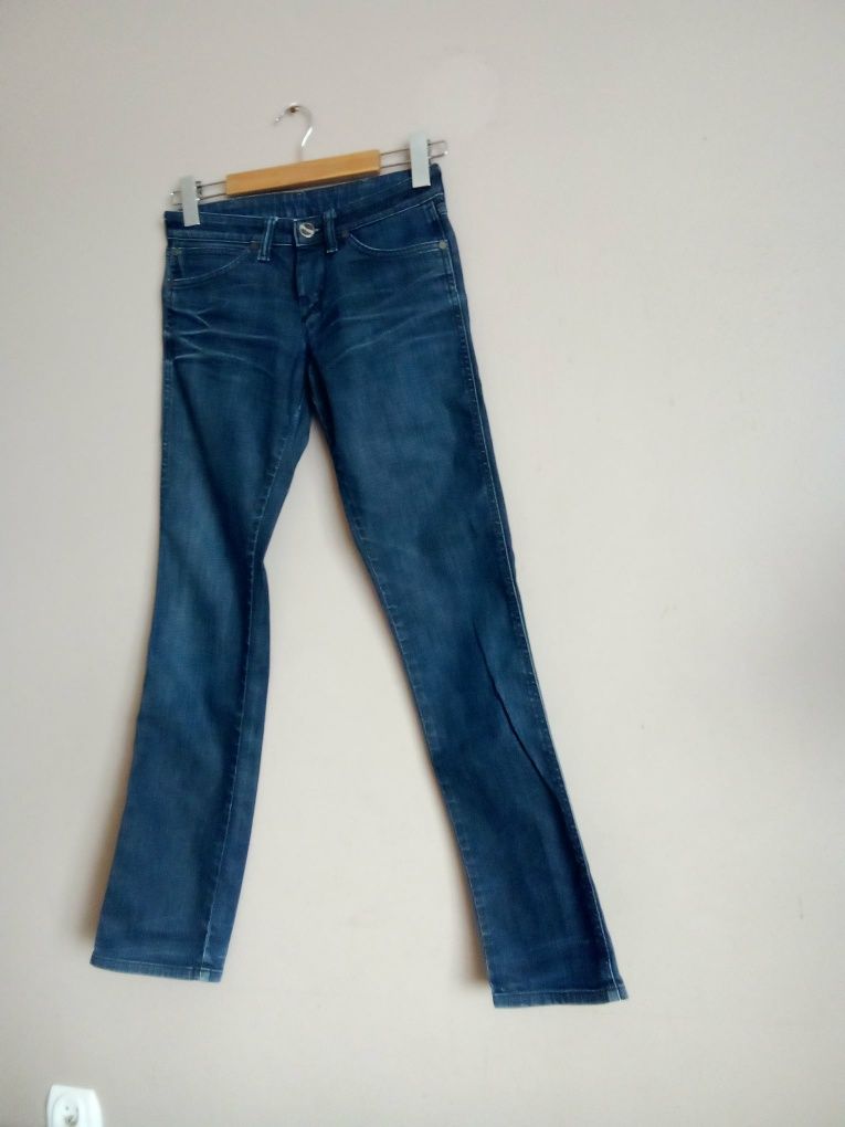 Ciemnoniebieskie jeansy damskie Wrangler