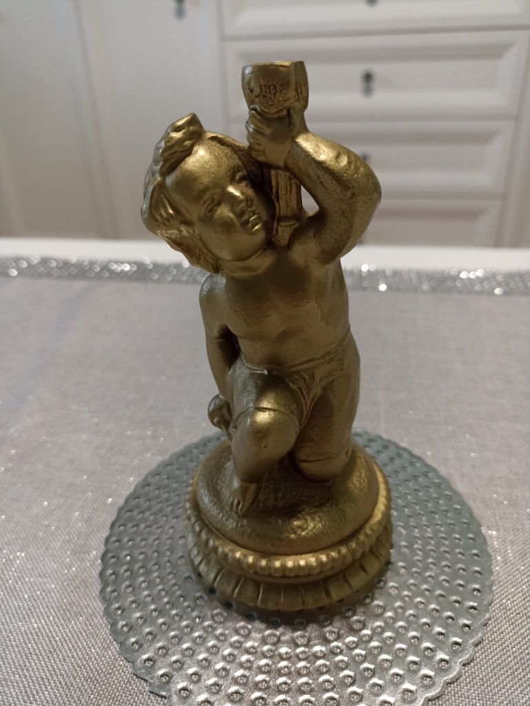 Figurka chłopca metalowa