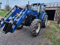 New Holland TM 115 z turem