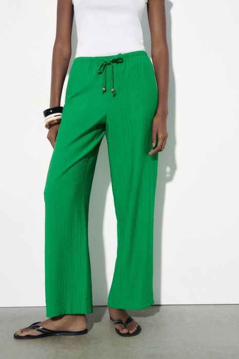 Широкі літні жаті штани зелені Zara