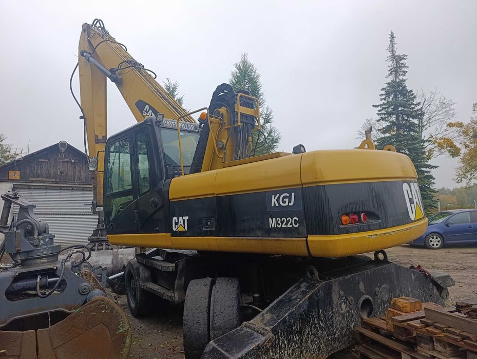 Экскаватор , Caterpiler M 322